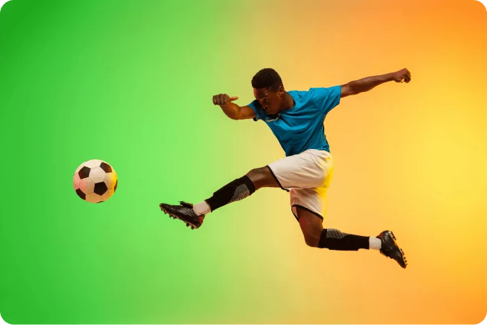 male-soccer-football-player-training-action-isolated-gradient-studio-neon-light-1